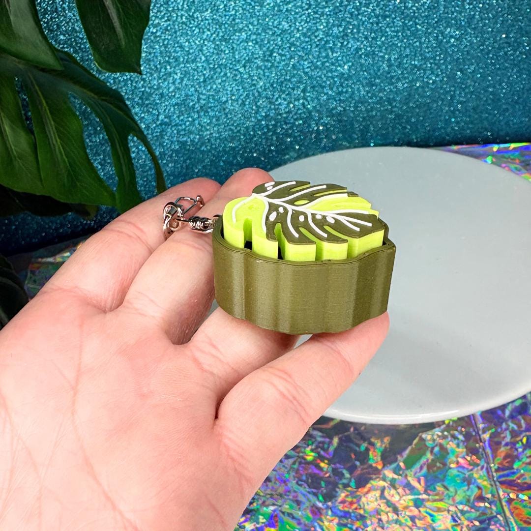 Monstera Clicker Keychain