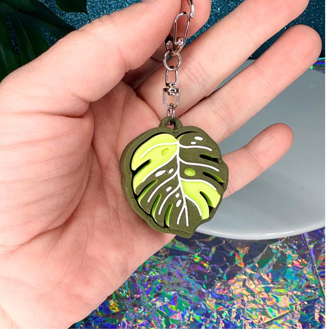 Monstera Clicker Keychain
