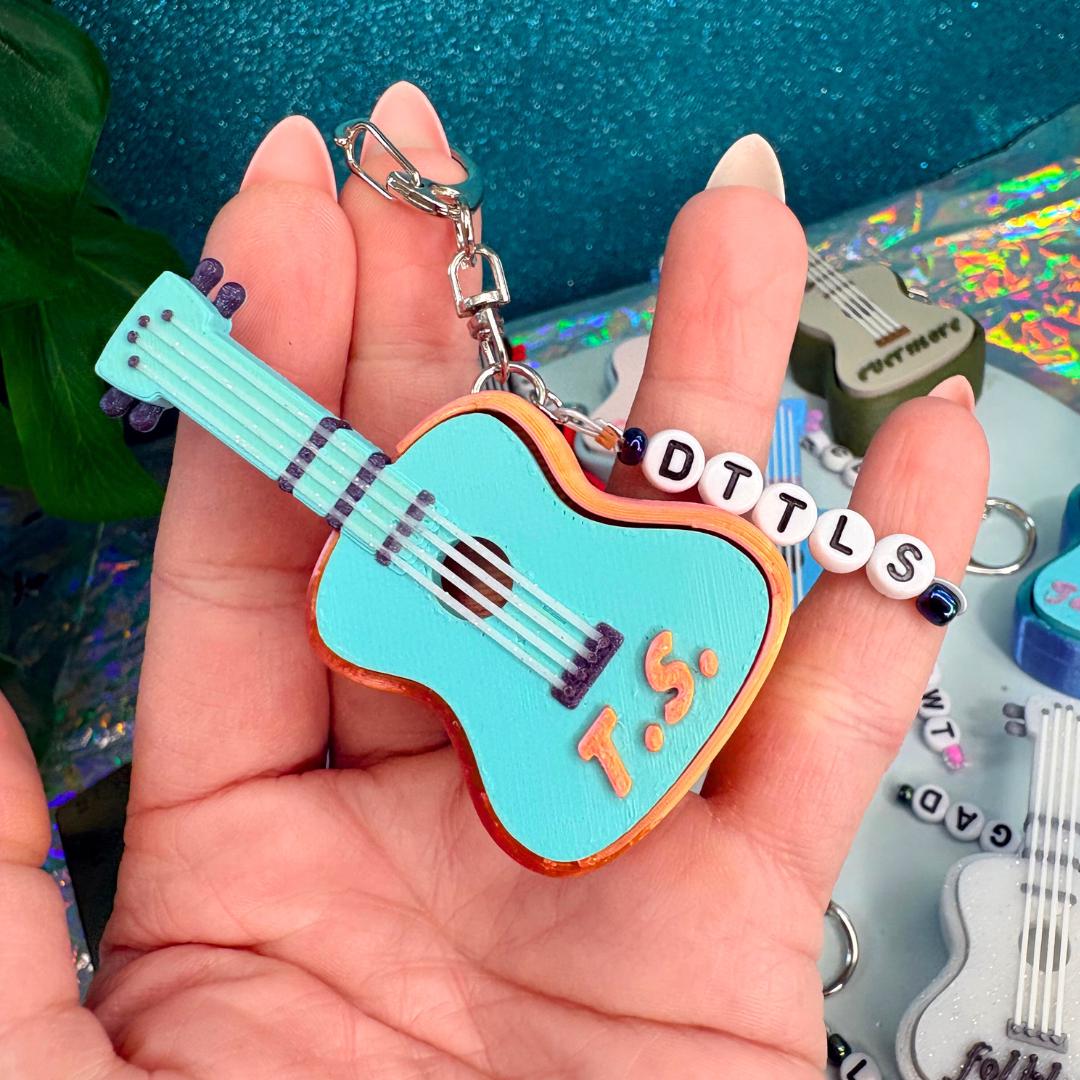 Eras Guitar Fidget Clicker